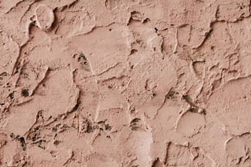Clay strokes on the wall. Backgound texture concept. Photo of rough strokes of brown beige paint . Wallpaper and copy space