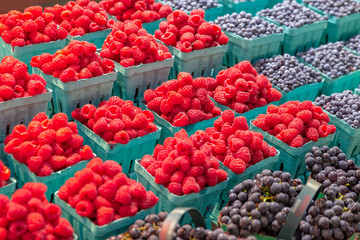 Variety of fresh fruit for sale on a farmers market stall