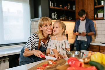 She's a great little helper in the kitchen