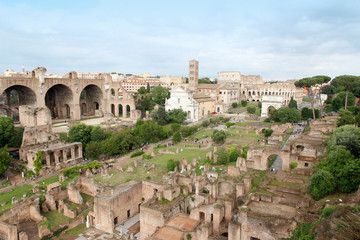 Obraz premium Aerial panoramic cityscape view of the Roman Forum during sunset in Rome, Italy