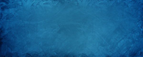 horizontal blue cement wall backdrop and background.