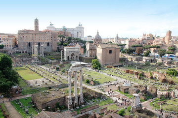 Fototapeta na wymiar Aerial panoramic cityscape view of the Roman Forum during sunset in Rome, Italy
