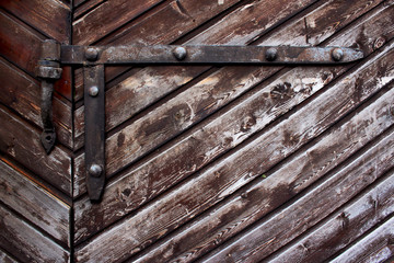 Background from old boards with cracked paint. The texture can be used as a background, in design, as a background for flat lay.