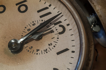 Old alarm clock close-up, leave a roar for a cup of aromatic coffee