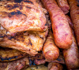Delicious fried pork meat. Sausage and pork fillets home cooked.