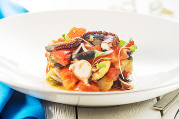 seafood salad on a white background in a restaurant