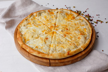 Italian Fast food pizza 4 cheeses on a white background