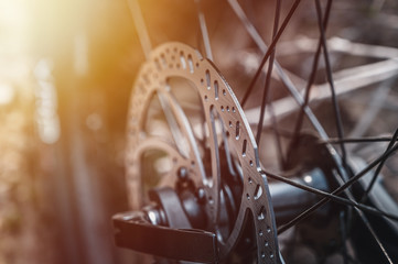 Disc brake close up. Disc brake on mountain bike for maximum stopping power. Cycling theme.