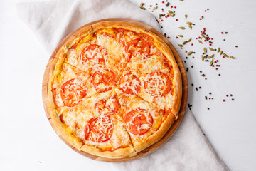 pizza on a wooden table
