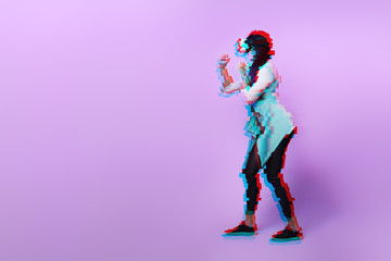 Woman is using virtual reality headset. Image with glitch effect.