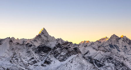 Sunrise above himalayan peaks. Cover sized photo. Beautiful high mountains landscape.