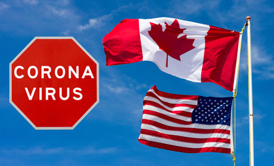 Canadian and USA flags with large red Corona virus warning sign next to them, travel restriction concept
