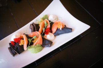 cuttlefish pancakes with red fish