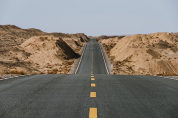 Gobi desert road on vast dry wilderness