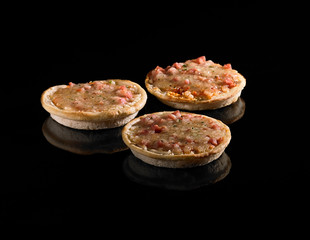 cakes on a black background