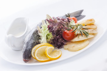 baked fish with decorations