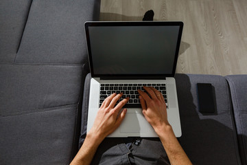 Fototapeta premium elegant business multitasking multimedia man using devices at home