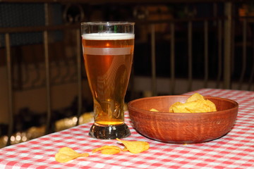 Beer with chips at the bar