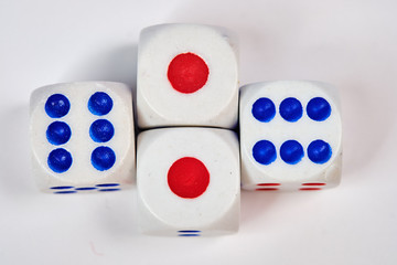 Four dice, cubes on a white background, space for text