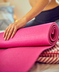 Attractive fit woman preparing for gym.