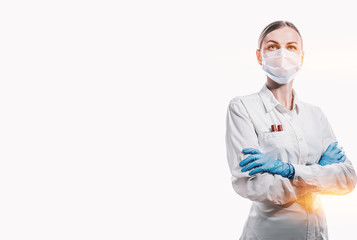 female doctor in medical mask on the face and gloves on a white background