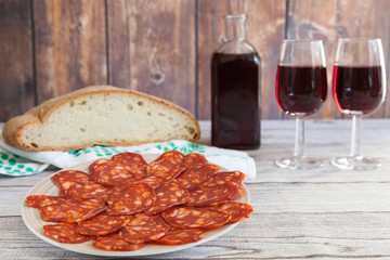 typical Spanish chorizo sausage, bread and wine