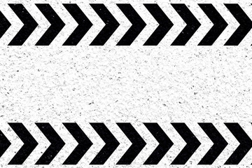 marquage au sol, chevrons noirs sur béton granité 