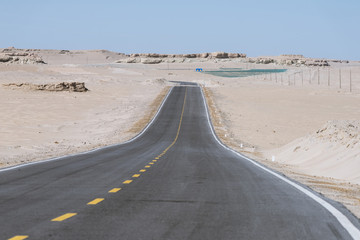 Gobi desert road on vast dry wilderness