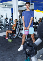 Man doing exercises with dumbbells