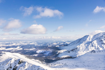 Ski resort in Poland. High mountain Tatras. Peak Kasprowy near Zakopane. Winter time. Beautiful landscape.