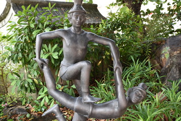Two-Person Yoga Pose Bronze Statue in Garden, Thailand