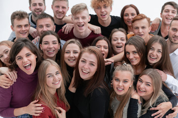 large group of friends with a smile looking at the camera