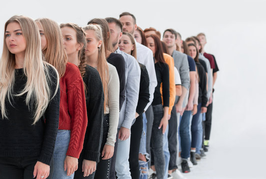 Group Of Diverse Young People Standing In Line.