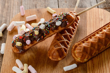 Close-up on waffle lollies. Wonderful desserts on a stick