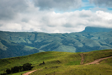 Fototapeta na wymiar mountain with green grass and beautiful sky