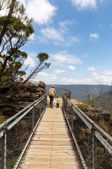 Woman and boy walking to Sublime Point, Blue Mountains