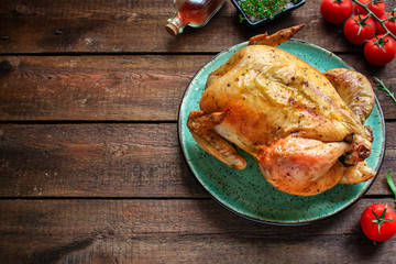 baked chicken, festive table (hen or turkey) menu concept background. top view. copy space for text keto or paleo diet