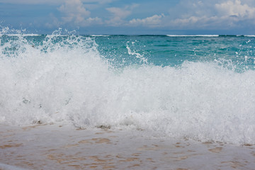 Wave on the coast close up. Bali, Indonesia.
