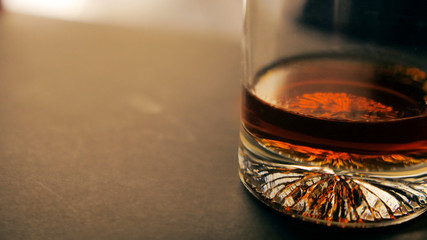 A glass of luxury rum with negative space