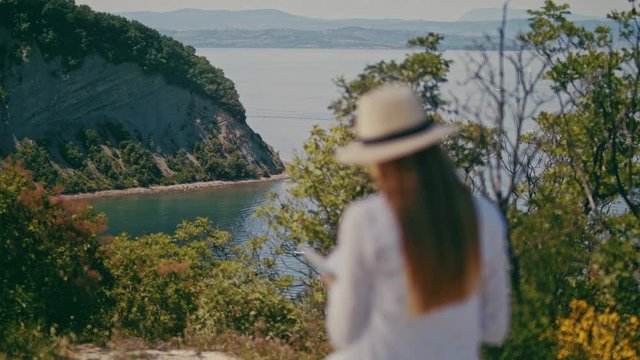 Girl looking over the bay