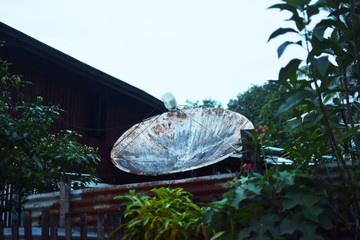 The large old parabolic antenna.