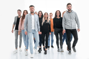large group of cheerful friends walking together