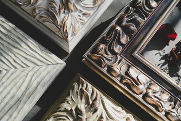 Corners of ornamental vintage picture frames. Baroque style. Details of classic wooden art frames.