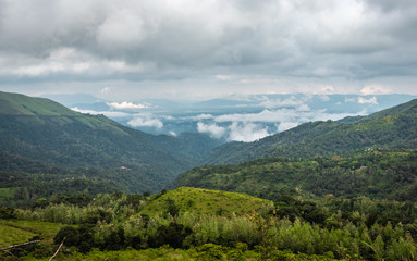 Fototapeta na wymiar mountain coverd with cloud layers and beautiful sky