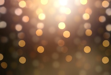 Garland lights golden pattern on brown blur background. Bokeh transparent pattern.