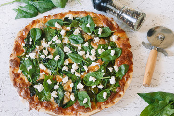 Pizza with spinach on a white background. Diet Pizza. Proper nutrition