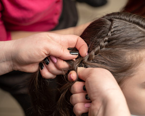 weave braid girl in a hair salon