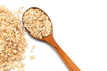 oat flakes and wooden spoon on a white background