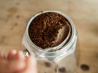 She makes her own coffee / espresso