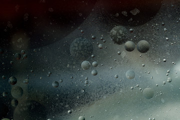 Abstrakcyjne wzory, koła przypominające planety w kosmosie - olejofotografia